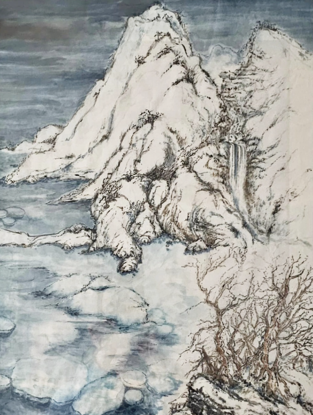 Snow Mountains — winter landscape with waterfall and bare branches